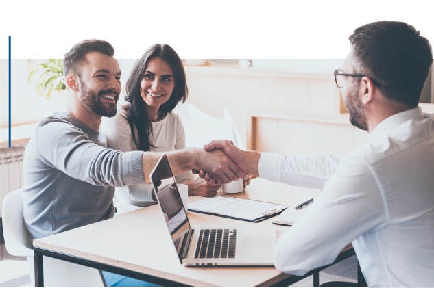 Couple and man shaking hands