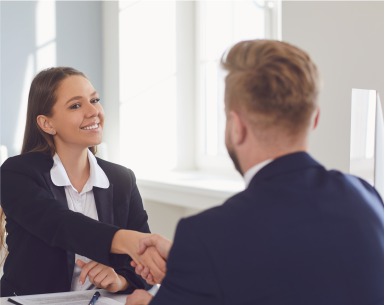 Man and woman shaking hands